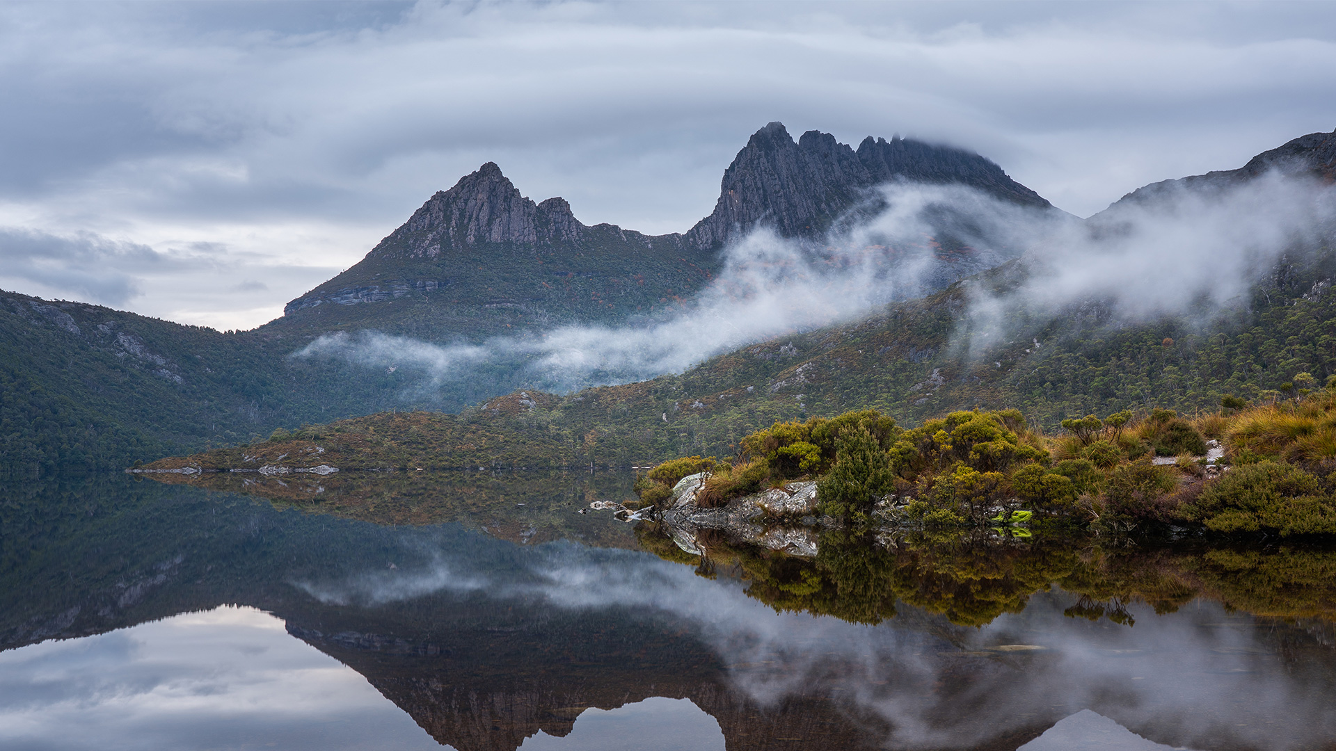 Mountains reflected in a still lake, Tasmania